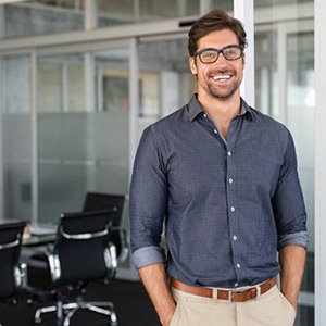 Smiling man in conference room